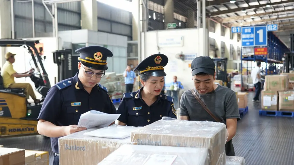 Hải quan đơn giản hóa thủ tục, giảm chi phí cho doanh nghiệp - Ảnh 2.